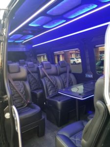 Scottsdale Sprinter Party Bus - black interior blue table